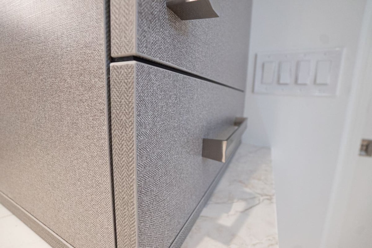 Floating vanity with ample storage and under-cabinet lighting, part of a Phoenix bathroom remodel by MGD Builders