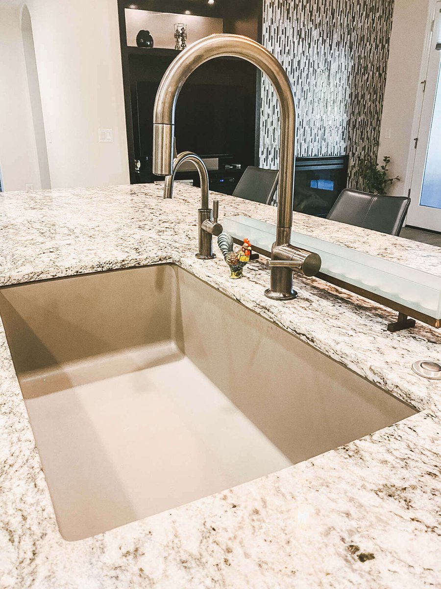 Another angle of stainless steel kitchen sink with granite countertop during kitchen remodel by MGD Builders in Phoenix, AZ