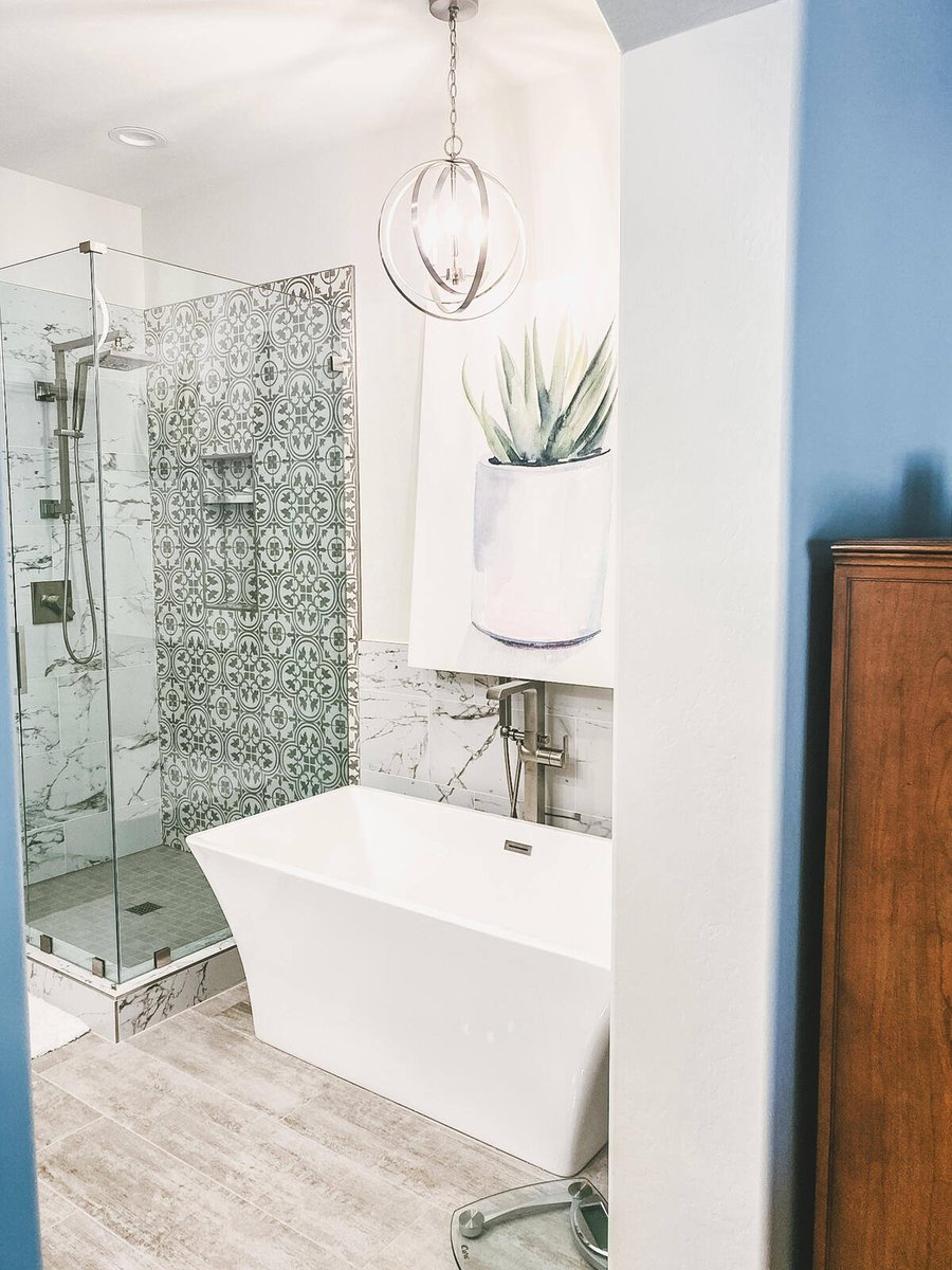 Another view of master bathroom featuring bathtub and glass shower in Phoenix, AZ remodel by MGD Builders