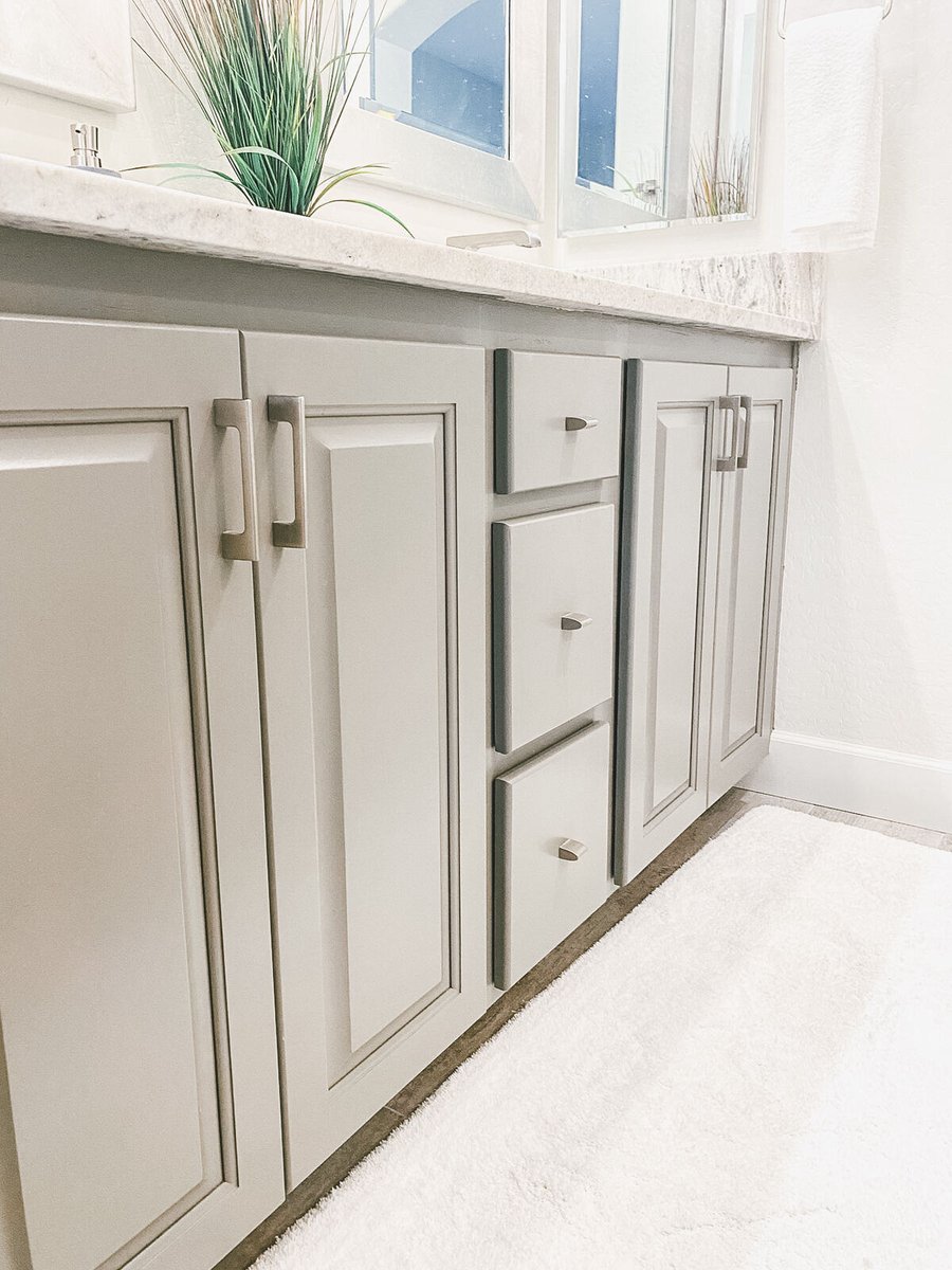 Double-sink vanity with granite countertop in a Phoenix, AZ bathroom remodel by MGD Builders