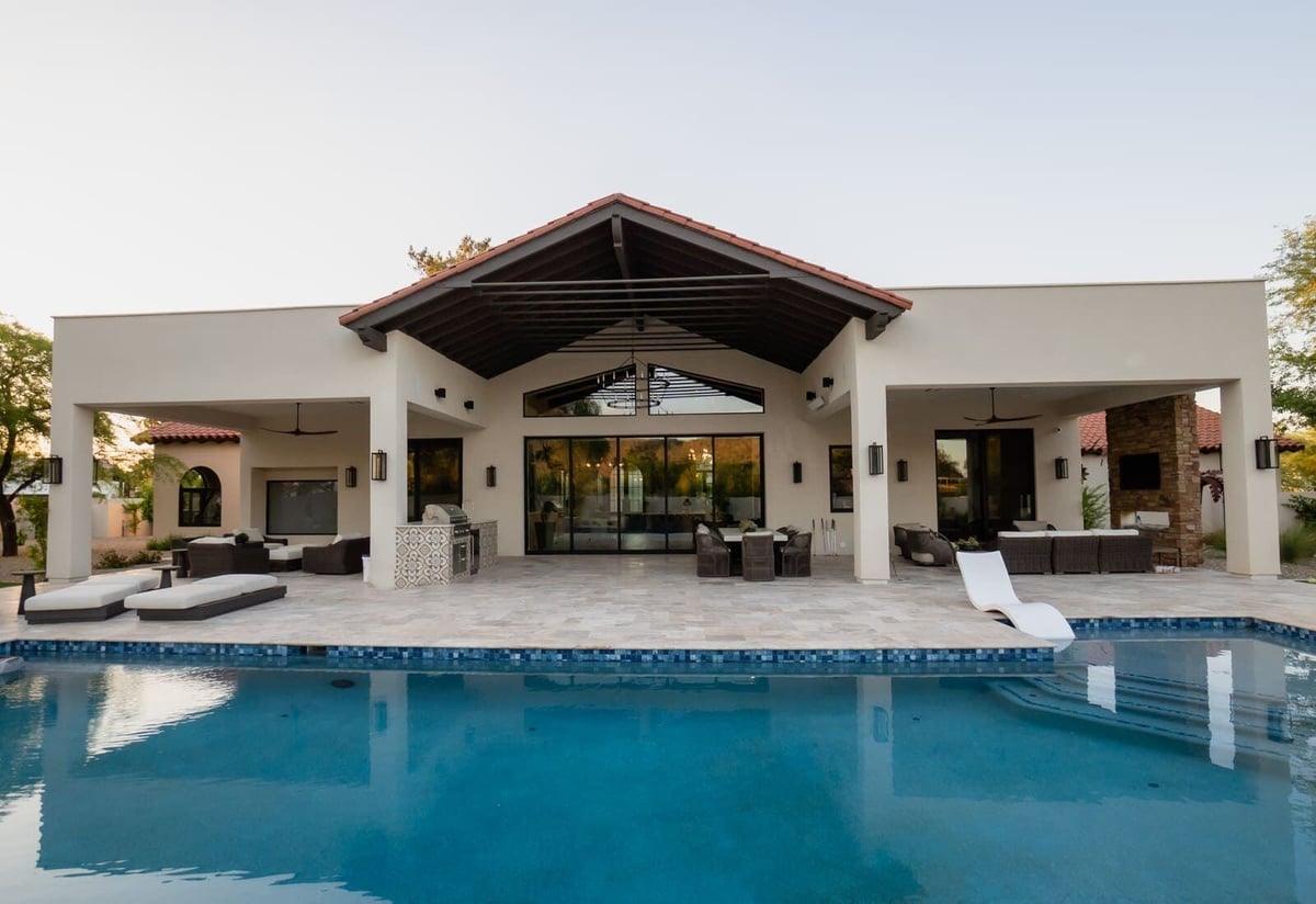 Backyard renovation with pool and outdoor seating by MGD Builders in Phoenix, AZ 