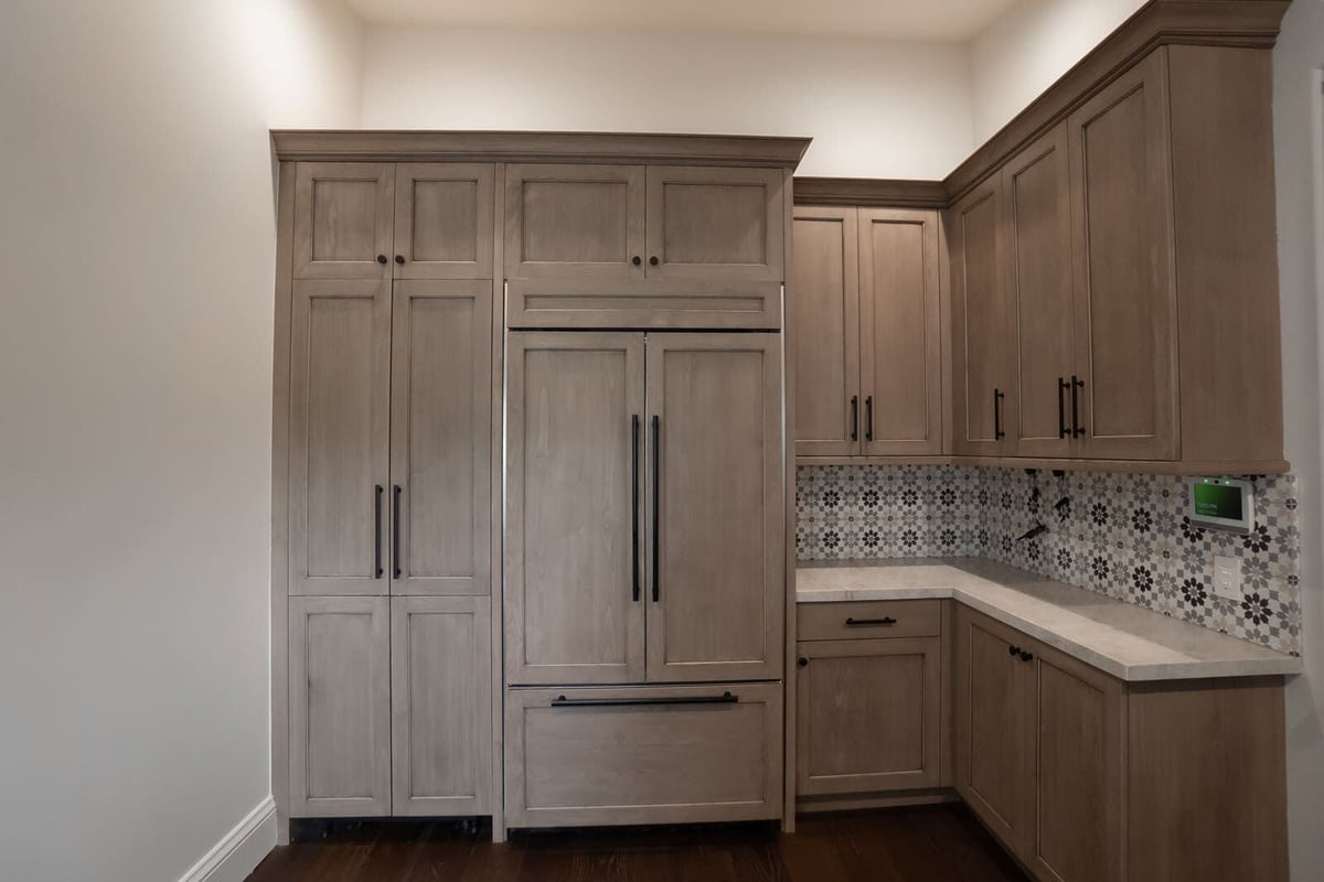 Custom kitchen cabinets and built-in refrigerator, part of the Mertel Whole Home Renovation by MGD Builders, Phoenix, AZ 