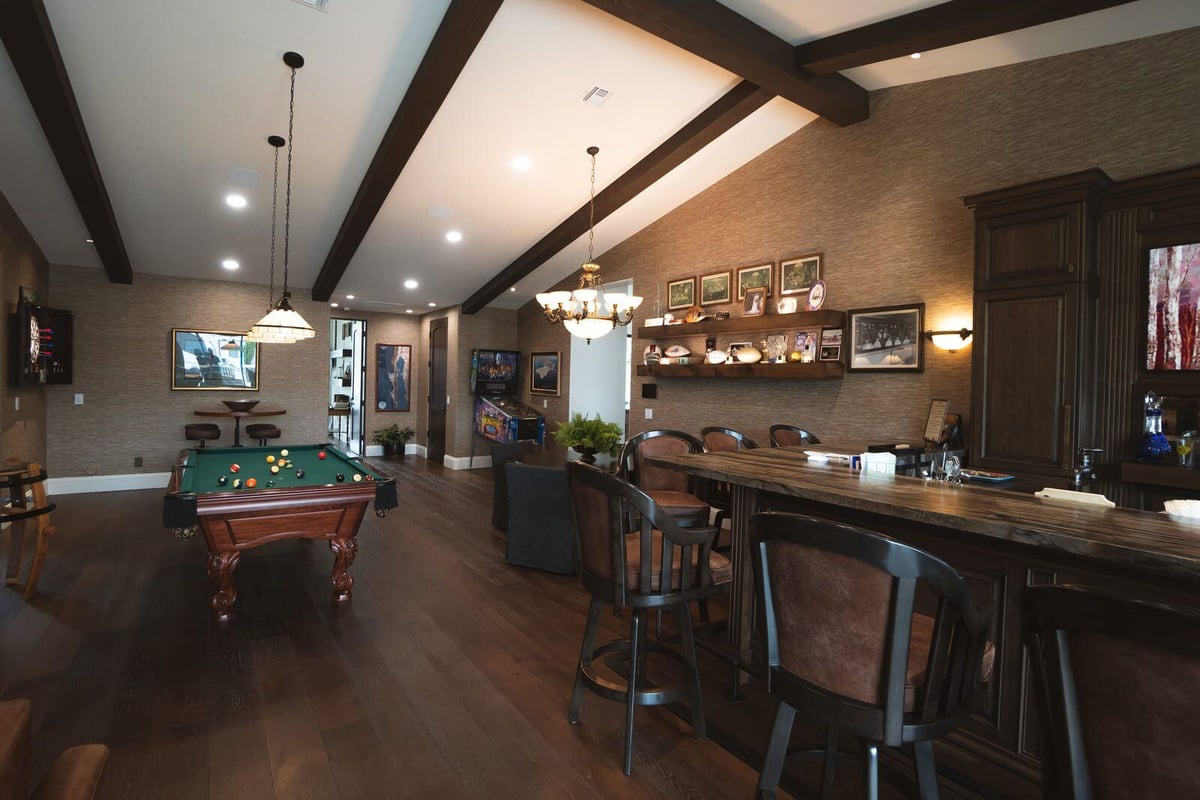 Elegant bar area with high-top seating in a modern home renovation by MGD Builders in Phoenix, AZ 