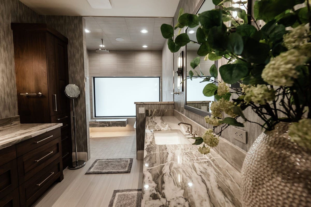 Luxurious bathroom featuring dual sinks and marble countertops, Phoenix renovation by MGD Builders 