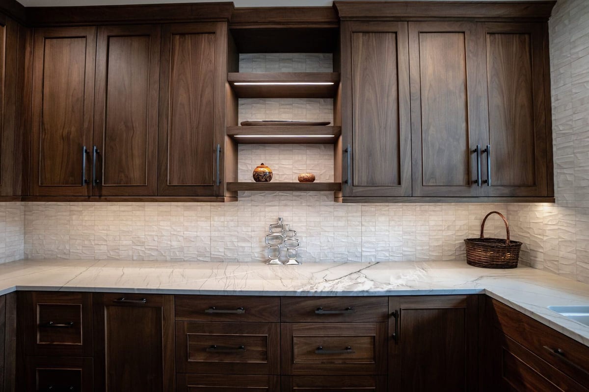 Phoenix custom kitchen remodel featuring wood cabinets and a sleek marble countertop by MGD Builders 