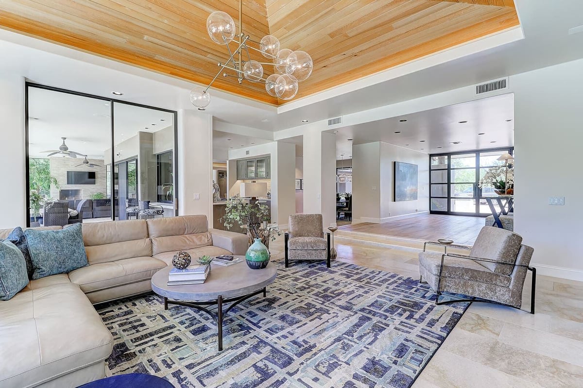 Stylish living space with natural lighting and modern decor in a custom renovation by MGD Builders, Paradise Valley, Phoenix, AZ 