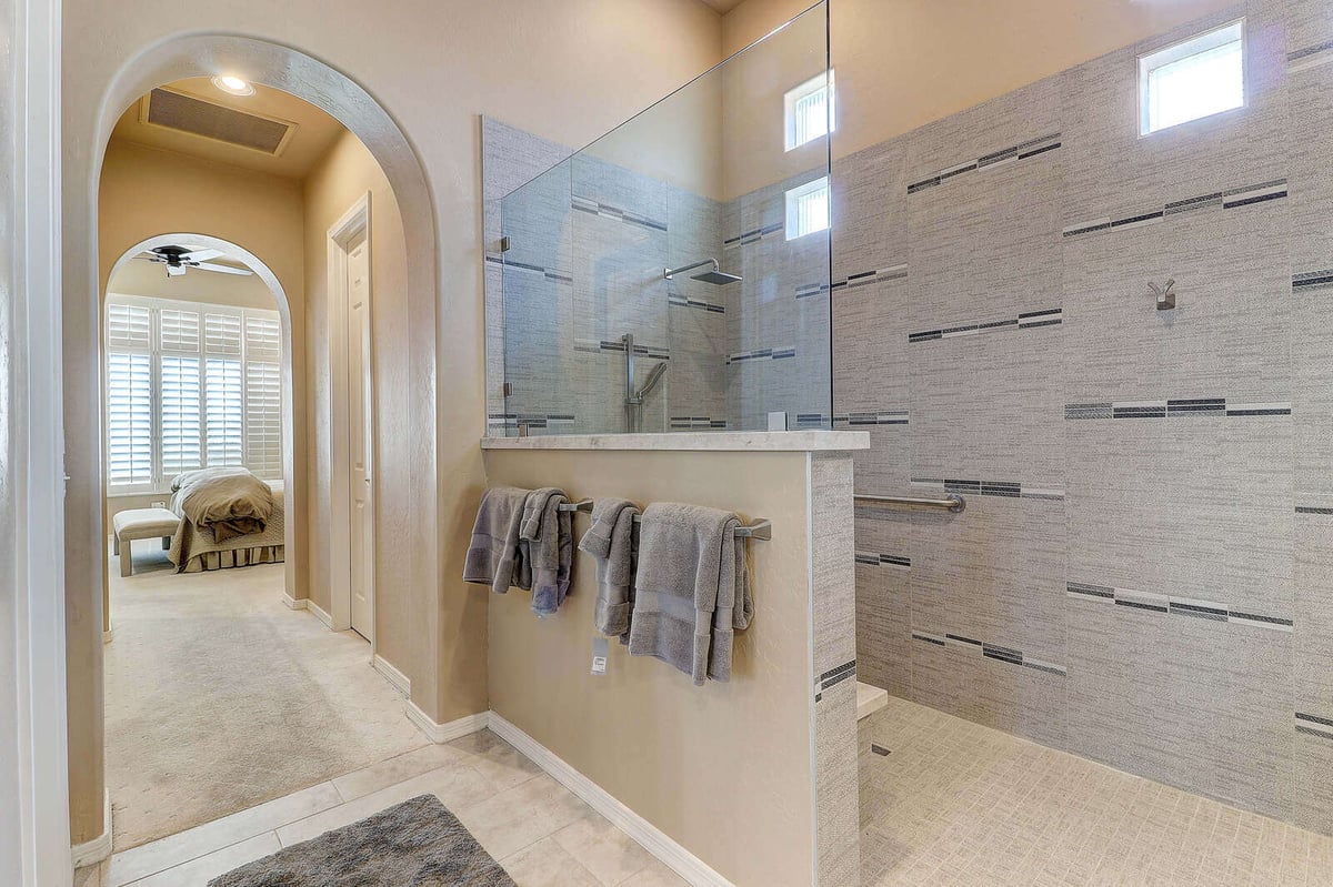 Contemporary walk-in shower with tiled walls and towel rack, MGD Builders, Phoenix, AZ