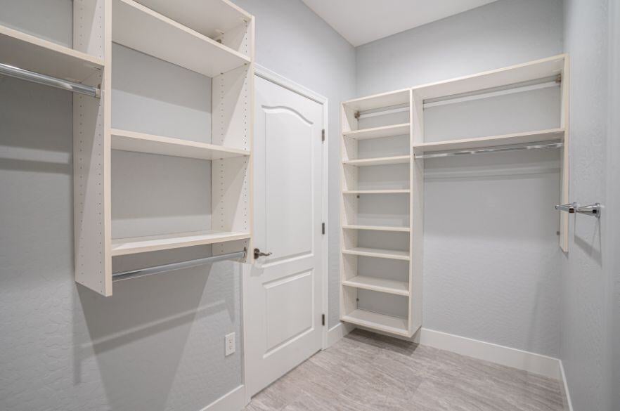 Towel Closet shelving in whole home remodel 